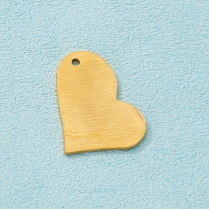 Golden heart-shaped stainless steel pendant with brushed texture and top hole for DIY jewelry