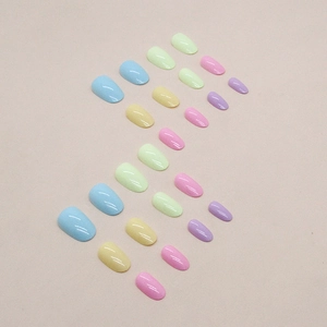 Short oval press-on nails set with macaron pastel rainbow colors and glossy finish