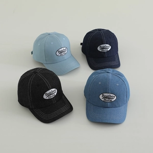 Kids denim baseball caps featuring Bestboy embroidery in blue, navy, and black colors