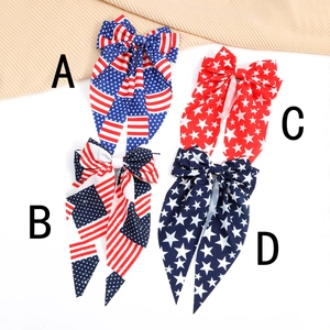 Four styles of American flag pattern bow hair clips with long streamers for July 4th