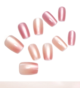 Detailed set of 10 cat-eye magnetic press-on nails with pink to gold gradient effect