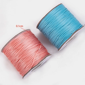 Detailed texture of 1mm pink and sky blue polyester wax cords for DIY jewelry making