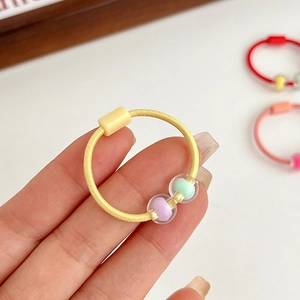 Pale yellow elastic hair tie with colorful acrylic beads and square charms for kids