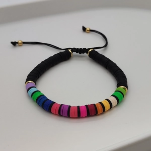 Detail of bohemian colorful Heishi bead bracelet with adjustable black braided cord