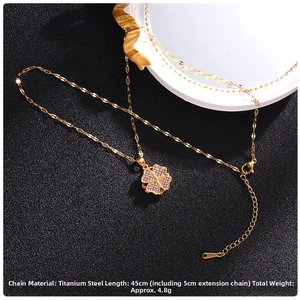 Detail of titanium steel gold clover necklace with purple zircon and lobster clasp