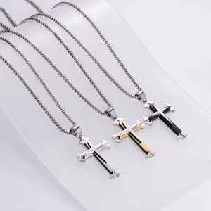 Three-layer cross pendant necklaces in silver, gold, and black steel finishes