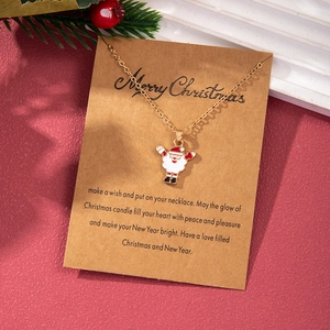 Christmas necklace featuring a Santa Claus pendant on a Merry Christmas wish card