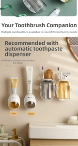Dettaglio del portaspazzolino a parete con bicchieri e due dispenser di dentifricio
