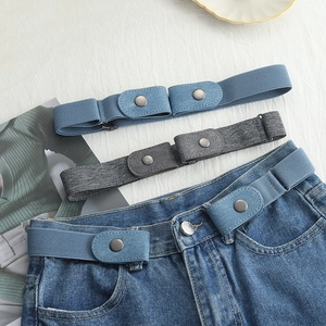 Flat lay of blue and grey elastic no-buckle belts with faux leather ends and snap buttons