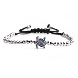 Adjustable silver beaded turtle bracelet with blue and purple cubic zirconia stones