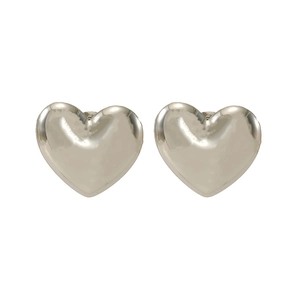 Macro detail of high-polish silver heart stud earrings in 3D stainless steel design