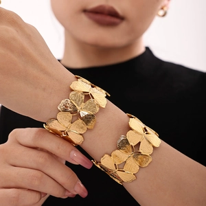 Exaggerated golden butterfly open cuff bracelet with brushed metal texture for women