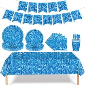 Detailed set of ocean wave party supplies including banners, plates, and blue tableware