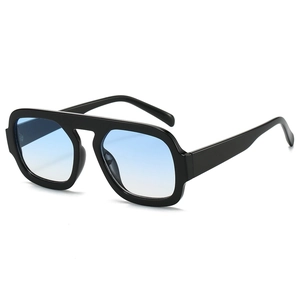 Classic pilot sunglasses with black frames and light blue gradient lenses in 45-degree view