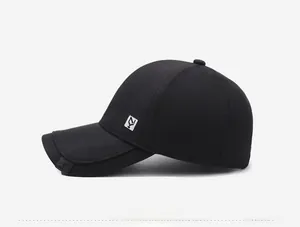 Side view of black baseball cap showing the NY logo embroidery and structured six-panel design