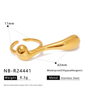 Detail of gold asymmetric stainless steel ring showing 42mm size and 17mm inner diameter