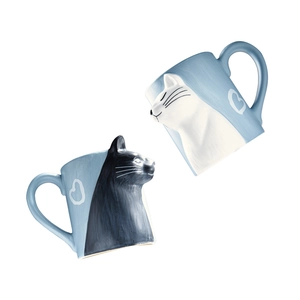 Matte ceramic cat mugs set with heart patterns for Valentine's Day on white background
