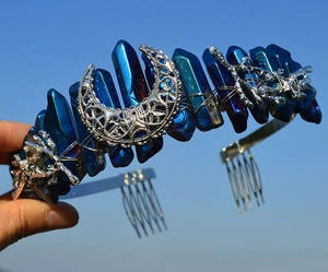 Close-up of Bohemian crystal crown with blue crystal points and silver moon detail