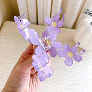 Cute purple flower claw clip for women made of translucent acrylic for hair styling