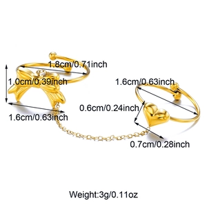 Detail view of 18k gold butterfly and heart ring set with dimensions and weight specs