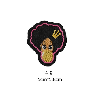 Close-up of African girl embroidery patch with golden crown and bubble gum, 5x5.8cm