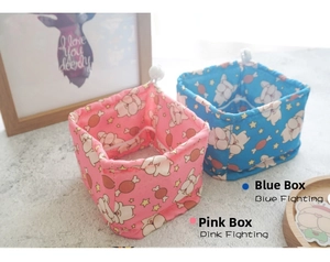 Detail of pink and blue pet cooling collars with cute Frenchie patterns and plastic buckles