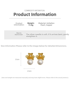 Detailed view of vintage-style clover earrings featuring textured gold metal and large pearls