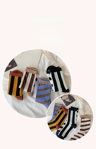 Close-up of soft cotton striped crew socks showing premium texture and breathable fabric