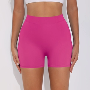 Front view of high-waisted hot pink yoga shorts with elastic skin-friendly fabric
