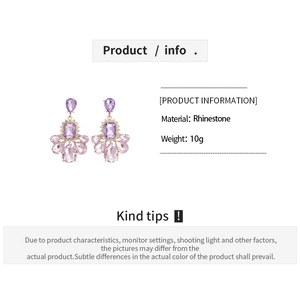 Detailed specs of rhinestone teardrop earrings weighing 10g with purple crystals