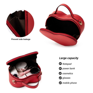 Macro shot of red heart shaped bag showing Saffiano PU leather and large capacity