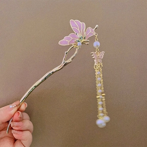 Classical Chinese butterfly hair stick with pink enamel, pearl tassels, and gold finish