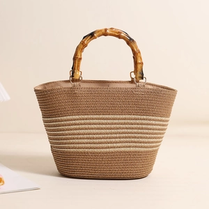 Striped straw tote bag with bamboo handles for beach vacation and casual summer style