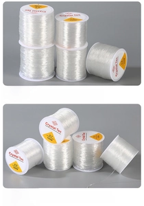 Detail showing various sizes of transparent elastic beading thread rolls for DIY jewelry