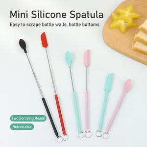Extendable mini silicone spatulas in four colors for scraping bottles and jars