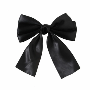Elegant black satin bow hair clip with long ribbons shown on a clean white background