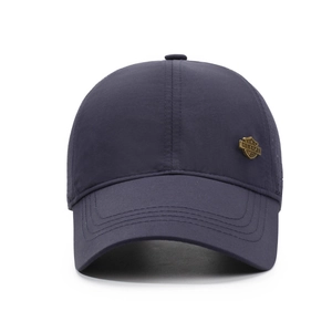 Classic navy blue breathable baseball cap with side metal emblem for outdoor sun protection