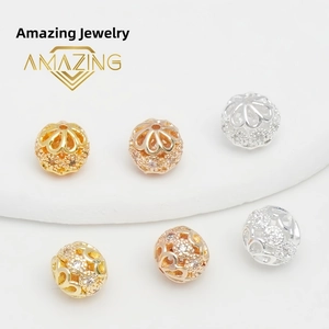 Macro view of 18K gold plated hollow beads with micro-set zircon for jewelry making