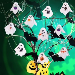 Close-up of Halloween hanging ghost puppets with spooky patterns and RIP BOO lettering