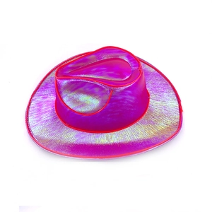 Macro detail of holographic pink laser cowboy hat with sparkling metallic finish