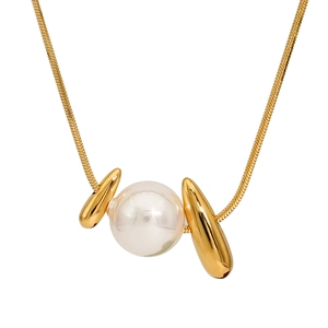 Elegant gold snake chain necklace featuring a large white pearl pendant on white background