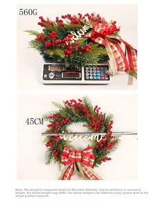 Close-up of a 45cm Christmas wreath with red berries and a wooden Welcome sign
