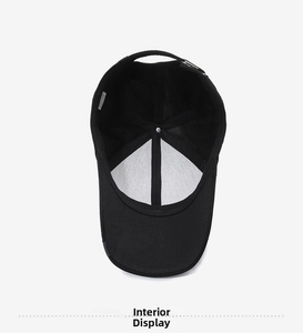 Detailed view of the black baseball cap's inner structure and stitching