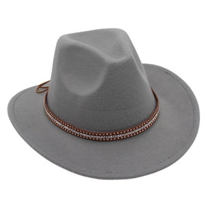 Detail of grey wool fedora hat featuring a brown band with decorative studs and rhinestones