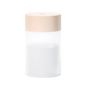Minimalist USB air humidifier with mist spray and frosted water tank for desktop
