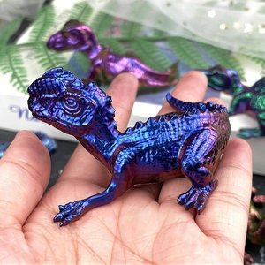 3D dinosaur resin mold showing iridescent metallic dragon model in hand-held view