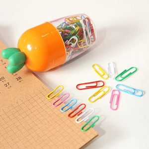 Creative carrot-shaped paperclip set with colorful metal clips in a cute storage box