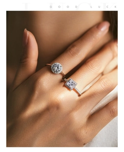 Close-up of S925 sterling silver ring set featuring round and square halo cubic zirconia