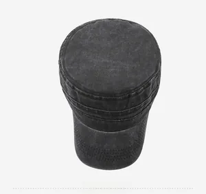 Top down view of washed grey cotton flat top military cap showing textured fabric details