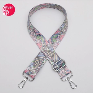 Close-up of mandala pattern replacement bag strap with adjustable silver metal hooks
